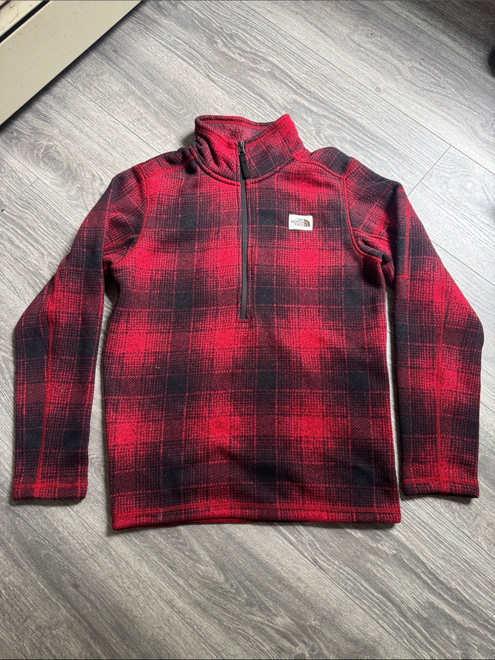 The North Face Men’s Red and Black Plaid Quarter-Zip Fleece